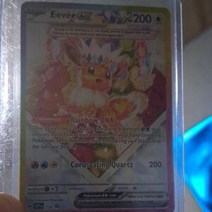 Pokemon Eevee-GX Rainbow Holo Card - Yellow Pink Blue